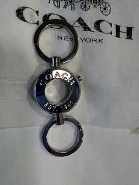 NWOT Coach Grommet Silver Circular Logo Valet Keychain